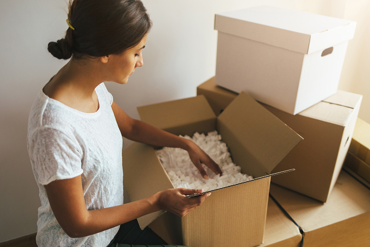 Women with packing materials for her Surrey house move